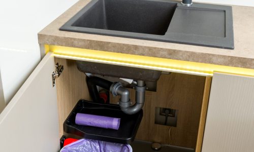 modern-kitchen-sink-with-open-cabinet-door-2026-03-25-23-40-47-utc